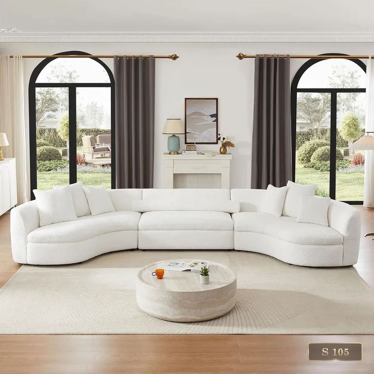 Curved sofa set in front of arched windows, catalogue reference S 105