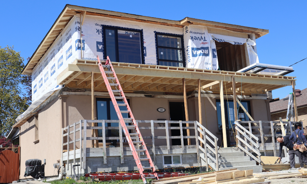 Second story addition in progress with completed wood framing by home construction services in Arlington, VA.