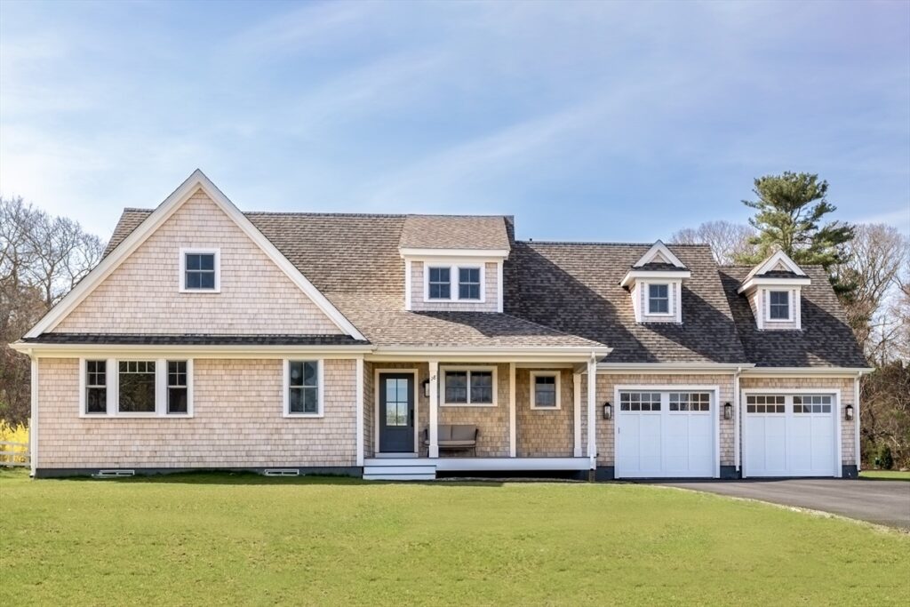 Large suburban house with new home addition under construction